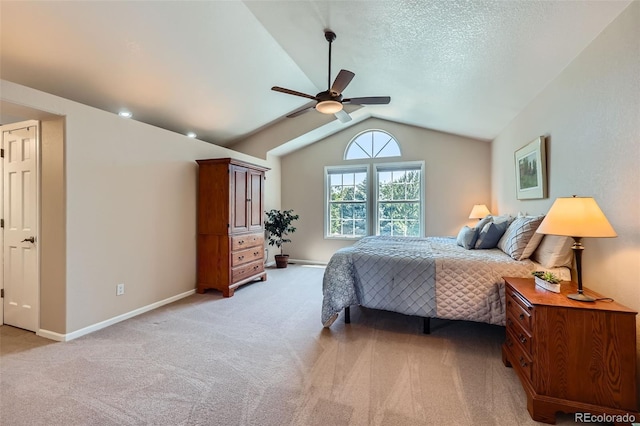 9733 Quay Loop, Broomfield, CO 80021 - bedroom featuring light colored carpet, vaulted ceiling, and a ceiling fan