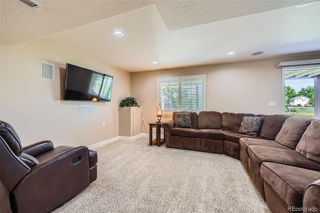 9733 Quay Loop, Broomfield, CO 80021 - living room featuring light carpet, plenty of natural light, and recessed lighting