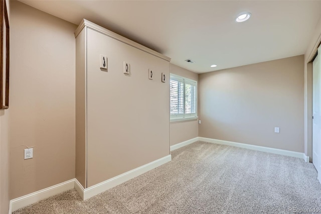 9733 Quay Loop, Broomfield, CO 80021 - unfurnished room featuring light carpet and recessed lighting