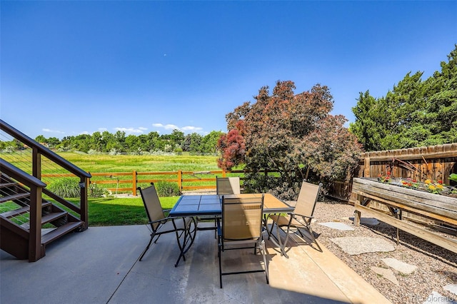 9733 Quay Loop, Broomfield, CO 80021 - fenced backyard with outdoor dining space and a patio area