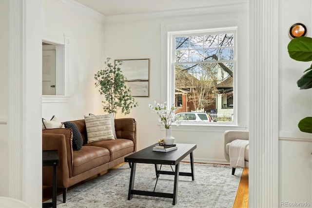 1748 W 36th Ave, Denver, CO 80211 - living room with wood finished floors and crown molding
