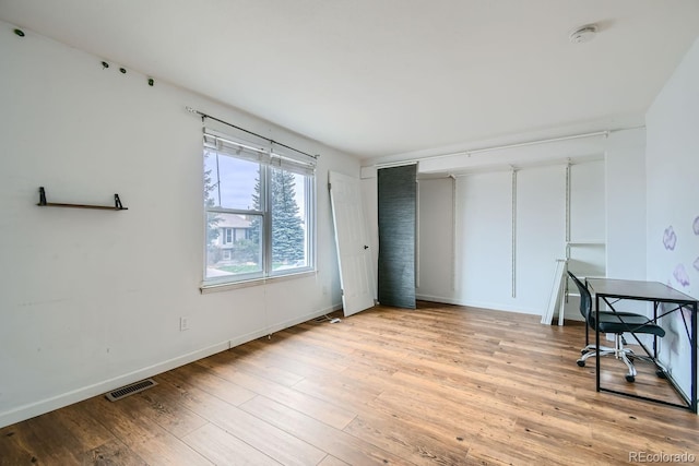 interior space with light hardwood / wood-style flooring