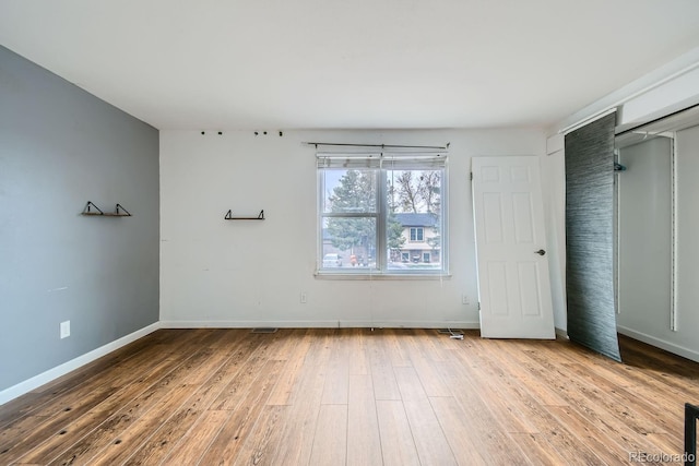 unfurnished bedroom featuring light hardwood / wood-style floors