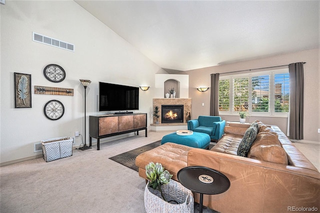 1155 S Balsam St, Lakewood, CO 80232 - carpeted living room with high vaulted ceiling, baseboards, a fireplace, and visible vents