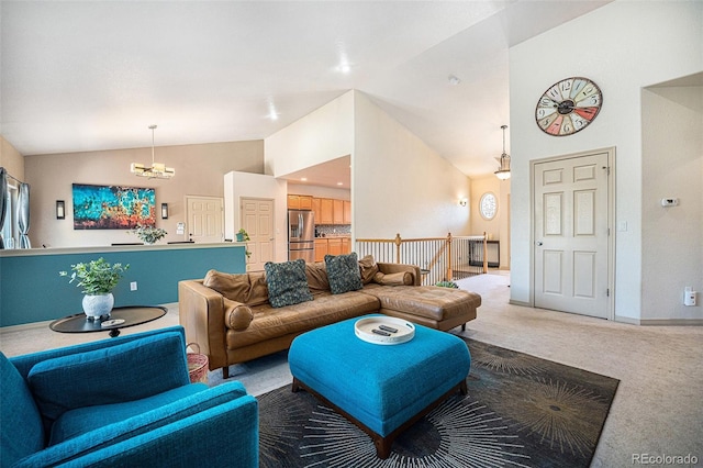 1155 S Balsam St, Lakewood, CO 80232 - living room featuring carpet floors, a notable chandelier, vaulted ceiling, and baseboards