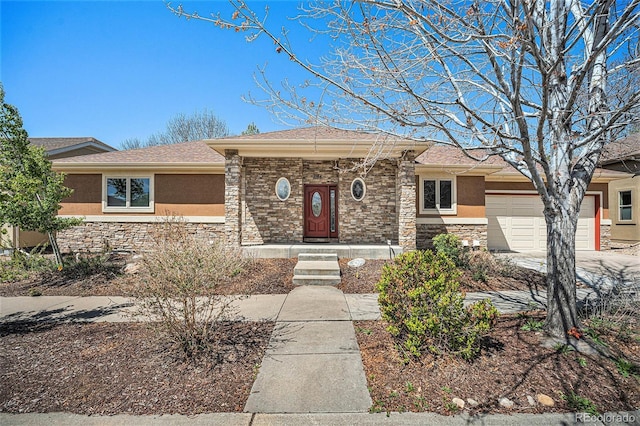 1155 S Balsam St, Lakewood, CO 80232 - view of front of property with a garage, stucco siding, and stone siding
