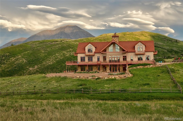 mountain view featuring a rural view