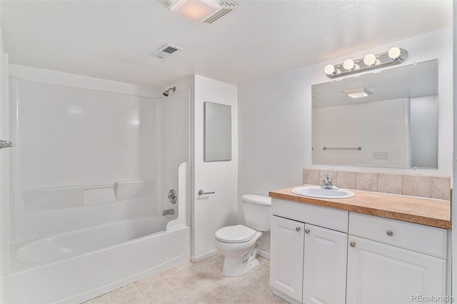 bathroom featuring toilet, bathtub / shower combination, vanity, and tile patterned flooring