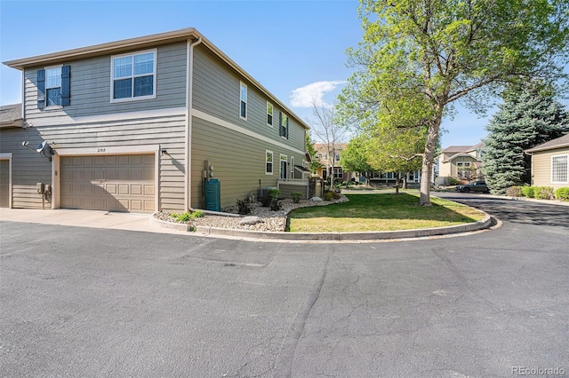 view of side of property featuring a garage