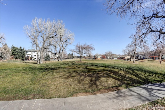 view of yard featuring a residential view