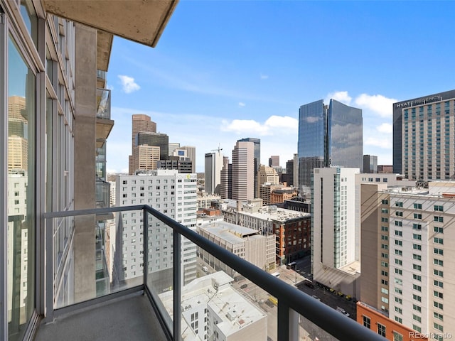 balcony featuring a view of city