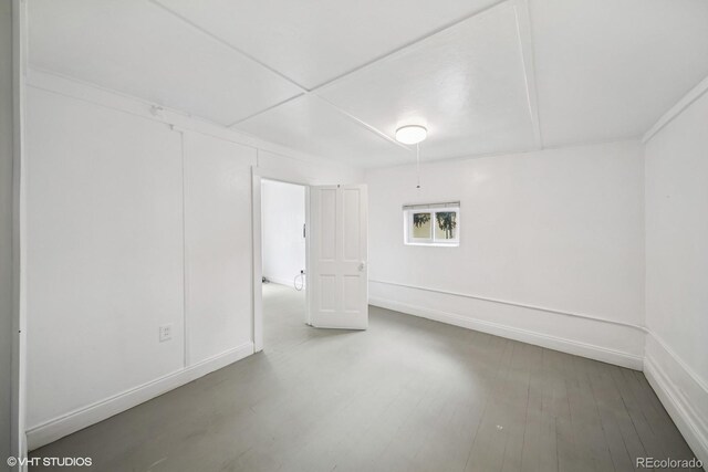 113 S 4th Ave, Brighton, CO 80601 - empty room featuring wood finished floors and baseboards