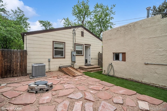 113 S 4th Ave, Brighton, CO 80601 - back of house with cooling unit and a patio area