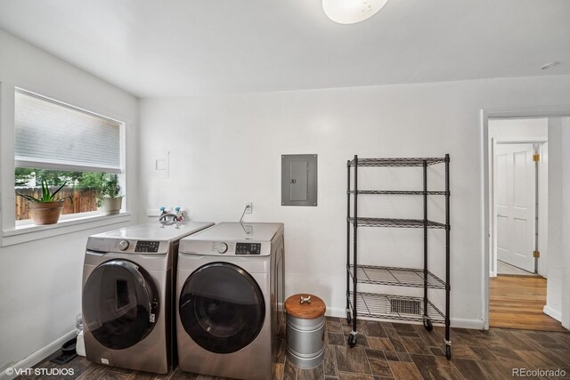 113 S 4th Ave, Brighton, CO 80601 - washroom featuring washing machine and clothes dryer, electric panel, and baseboards