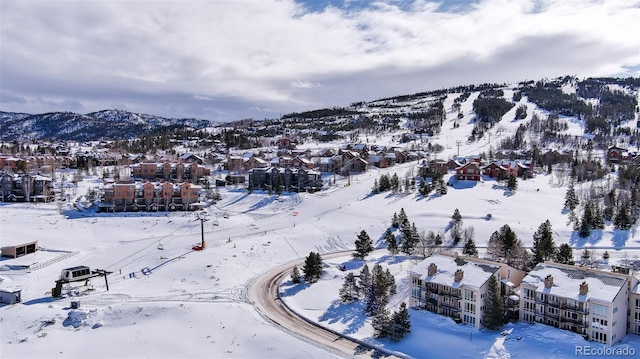 96 Mountainside Unit B-8, Granby, CO 80446 - snowy aerial view with a residential view and a mountain view