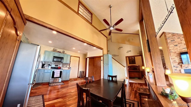 96 Mountainside Unit B-8, Granby, CO 80446 - dining room with ceiling fan, wood finished floors, a high ceiling, and recessed lighting