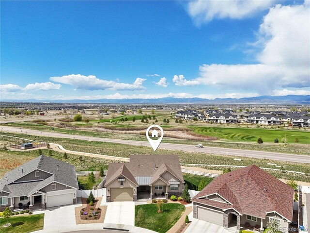 bird's eye view featuring a residential view and a mountain view