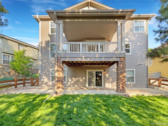 24955 E Roxbury Pl, Aurora, CO 80016 - rear view of house with a balcony and a patio area