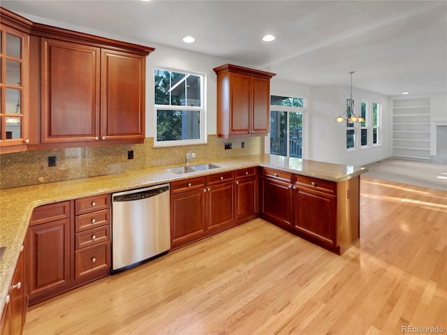 24955 E Roxbury Pl, Aurora, CO 80016 - kitchen featuring dishwasher, light wood-style floors, tasteful backsplash, a peninsula, and a chandelier