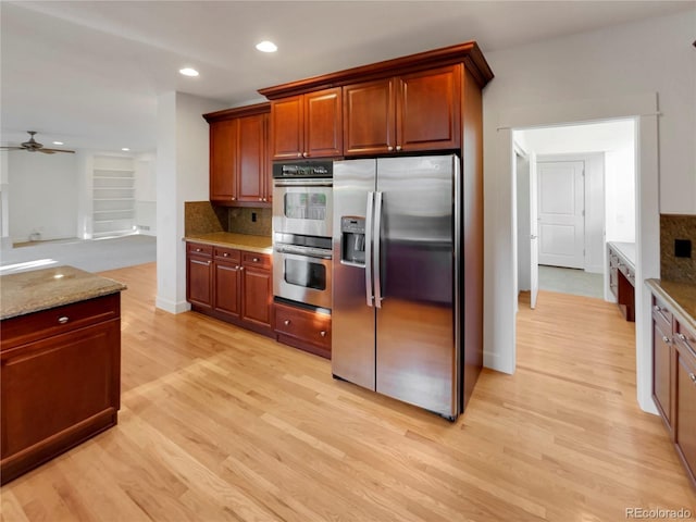24955 E Roxbury Pl, Aurora, CO 80016 - kitchen featuring stainless steel appliances, ceiling fan, backsplash, light wood-style flooring, and recessed lighting
