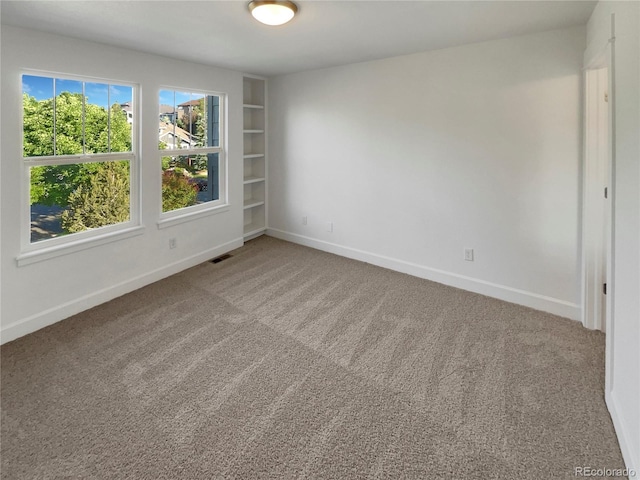 24955 E Roxbury Pl, Aurora, CO 80016 - carpeted empty room featuring baseboards