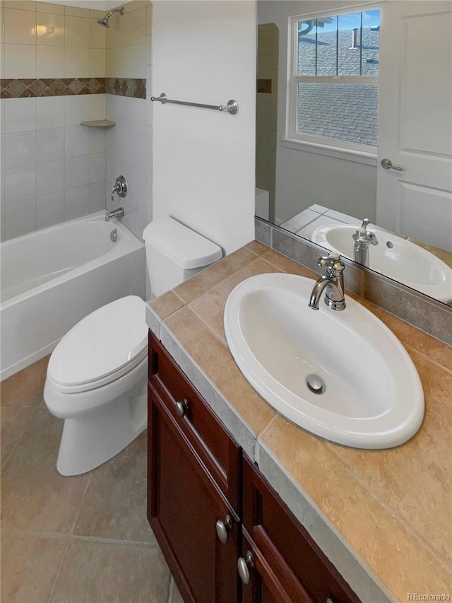 24955 E Roxbury Pl, Aurora, CO 80016 - bathroom featuring vanity, shower / bath combination, and tile patterned floors