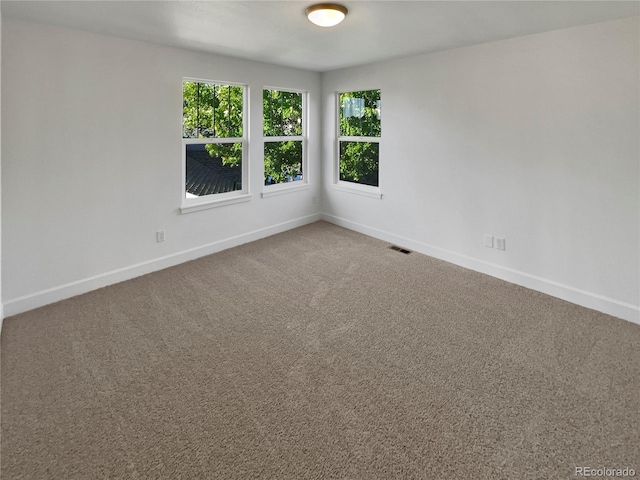 24955 E Roxbury Pl, Aurora, CO 80016 - carpeted spare room featuring baseboards