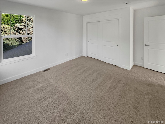 24955 E Roxbury Pl, Aurora, CO 80016 - unfurnished bedroom with carpet floors and a closet