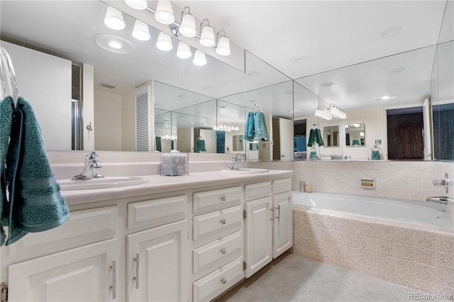 7160 W Stetson Pl Unit 27, Littleton, CO 80123 - bathroom with double vanity and a garden tub