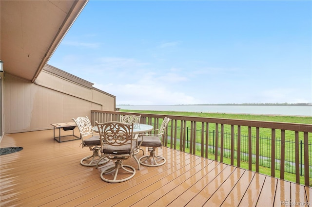 7160 W Stetson Pl Unit 27, Littleton, CO 80123 - wooden terrace with a water view, outdoor dining space, and a yard