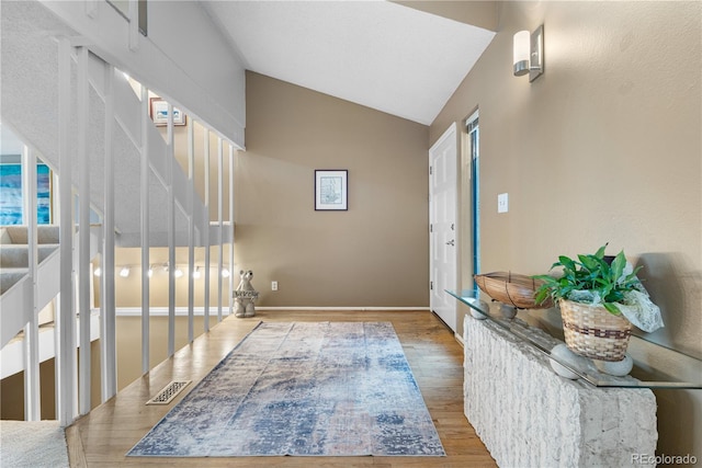 7160 W Stetson Pl Unit 27, Littleton, CO 80123 - foyer featuring wood finished floors and high vaulted ceiling