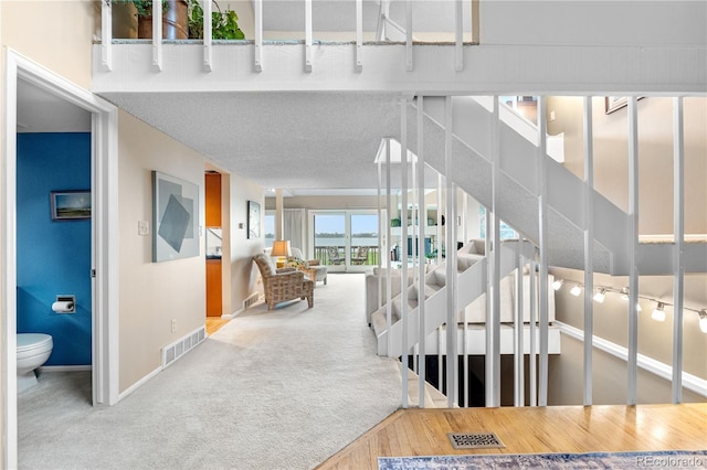 7160 W Stetson Pl Unit 27, Littleton, CO 80123 - stairway featuring baseboards and carpet flooring