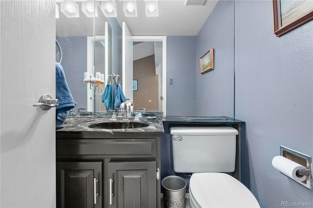 7160 W Stetson Pl Unit 27, Littleton, CO 80123 - half bath featuring toilet and vanity