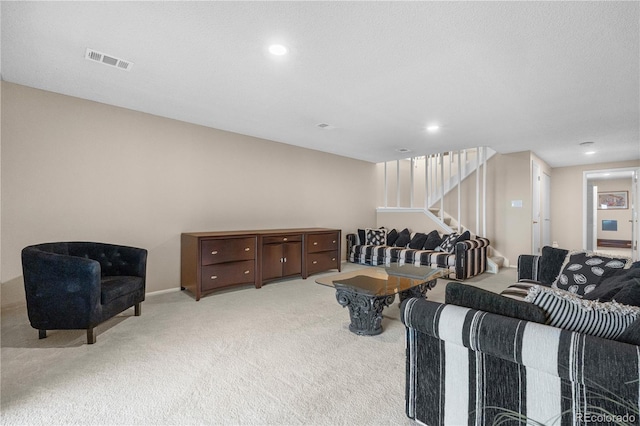 7160 W Stetson Pl Unit 27, Littleton, CO 80123 - living room featuring light colored carpet, stairs, and recessed lighting