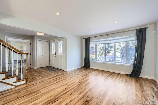 entrance foyer featuring light wood-type flooring