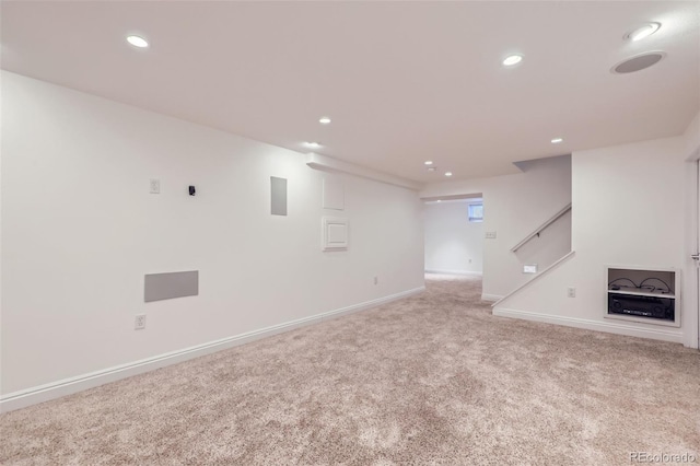 interior space featuring light colored carpet