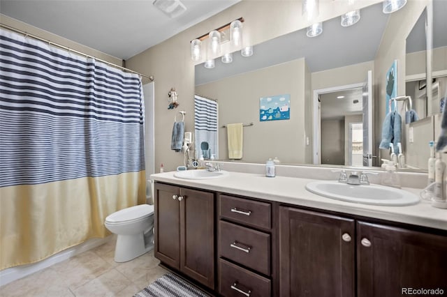 full bath with toilet, tile patterned flooring, visible vents, and a sink