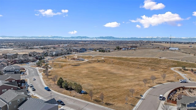 drone / aerial view with a residential view and a mountain view