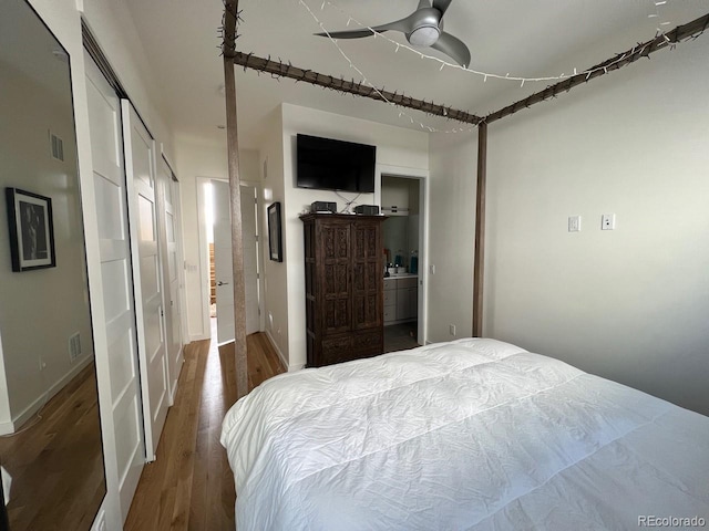 1284 Osceola St, Denver, CO 80204 - bedroom featuring wood finished floors