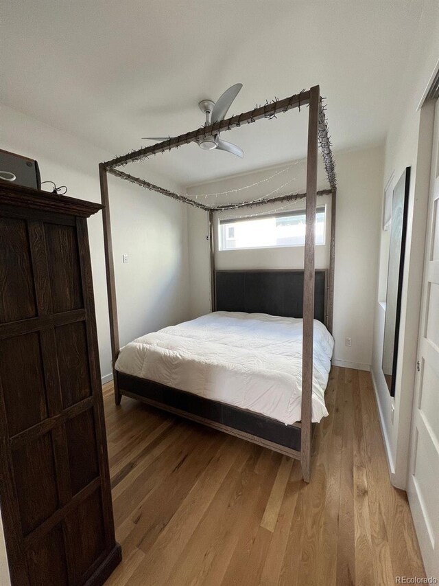 1284 Osceola St, Denver, CO 80204 - bedroom featuring light wood-style flooring and a ceiling fan
