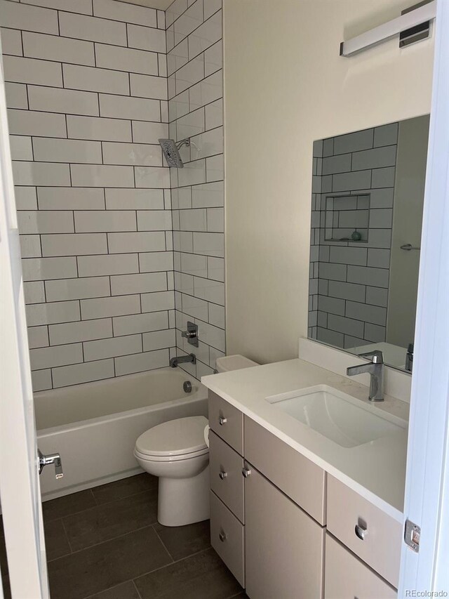 1284 Osceola St, Denver, CO 80204 - bathroom with vanity, shower / washtub combination, and tile patterned flooring
