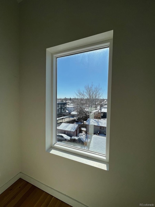 1284 Osceola St, Denver, CO 80204 - detailed view of baseboards and wood finished floors