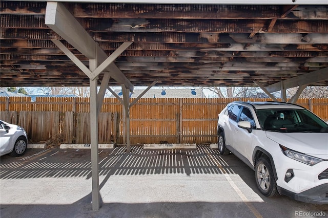 view of car parking with a carport