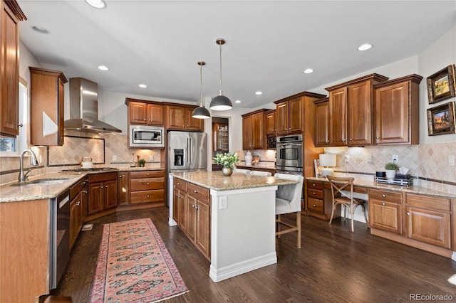 5322 Devils Head Cir, Golden, CO 80403 - kitchen with wall chimney range hood, a sink, appliances with stainless steel finishes, decorative backsplash, and recessed lighting