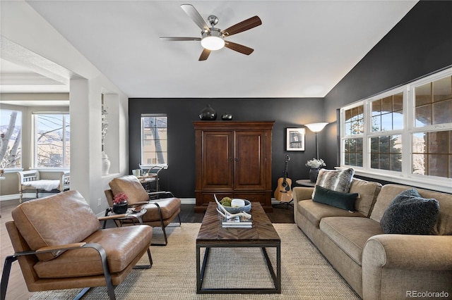 5322 Devils Head Cir, Golden, CO 80403 - living area with vaulted ceiling, ceiling fan, baseboards, and light wood finished floors
