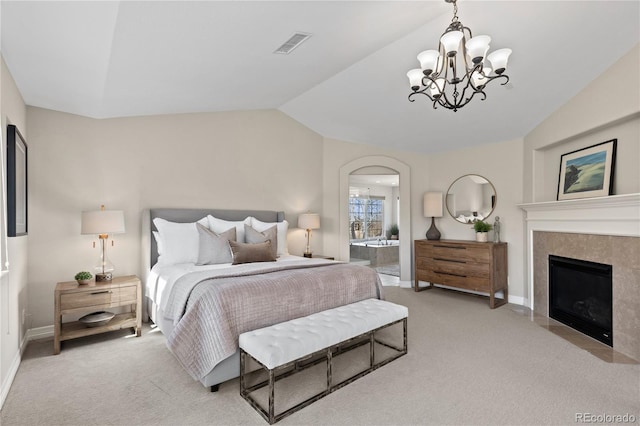 5322 Devils Head Cir, Golden, CO 80403 - bedroom with lofted ceiling, light carpet, a chandelier, baseboards, and a fireplace