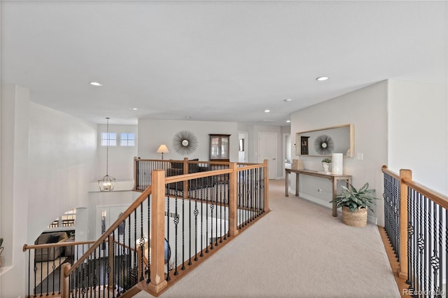 5322 Devils Head Cir, Golden, CO 80403 - hallway featuring an upstairs landing, recessed lighting, light colored carpet, and baseboards