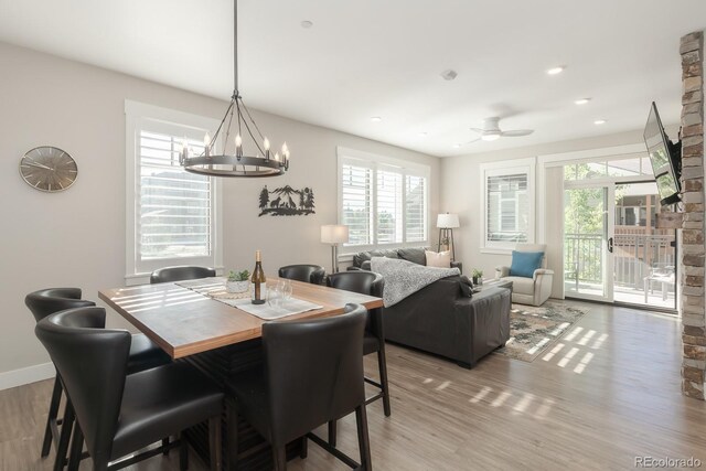 400 Baker Dr Unit Te103, Winter Park, CO 80482 - dining space with light wood-style floors, a chandelier, ceiling fan, and recessed lighting