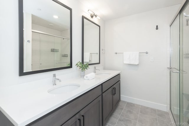 400 Baker Dr Unit Te103, Winter Park, CO 80482 - full bath with double vanity, a shower stall, and tile patterned flooring