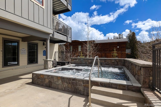 400 Baker Dr Unit Te103, Winter Park, CO 80482 - view of patio / terrace with an outdoor hot tub